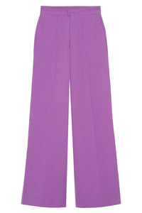 Front view of women's high-waisted purple wide leg pants with front pintucks